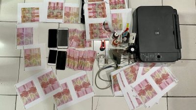Barang Bukti Uang palsu dan Barang Pencetak Upal. Foto: ist