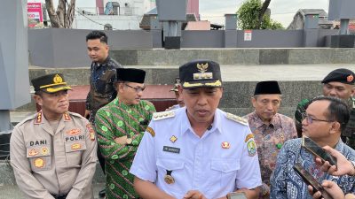 Wali Kota Bekasi Tri Adhianto dan Kapolres Metro Bekasi Kota Kombes Dani Hamdani seusai apel gelar pasukan.Foto: Joy/Gobekasi.id