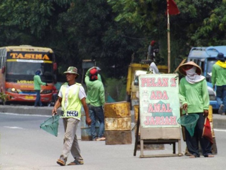 Ilustrasi Permintaan Sumbangan di Jalan Raya