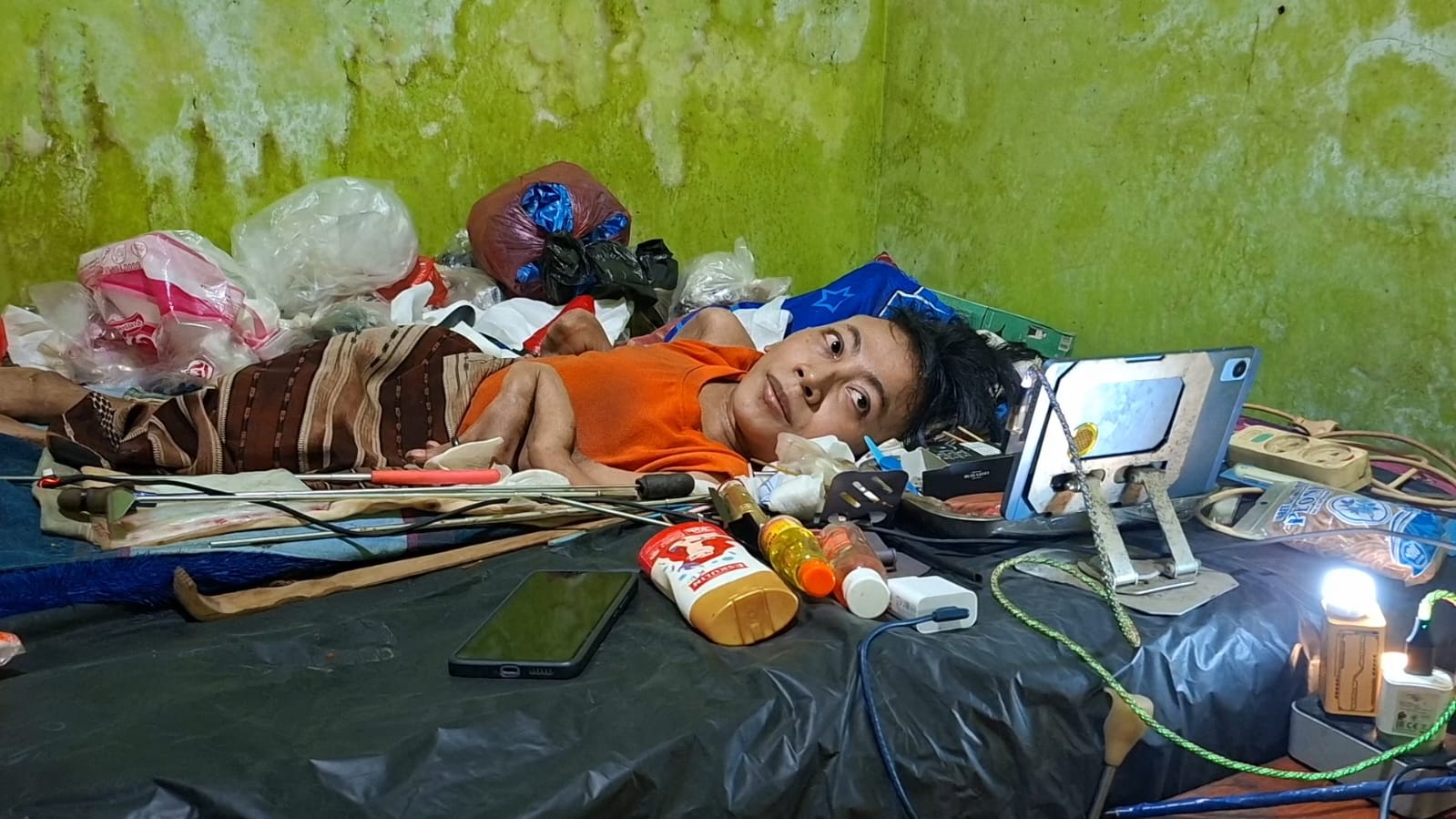 Kota Bekasi - Nurhadi (29), pria penyandang disabilitas asal Tambun Selatan, mendadak jadi perbincangan besar di media sosial. Foto: Septian/Gobekasi.id.