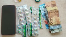 Kabupaten Bekasi - Sitaan obat keras daftar G, handphone dan uang tunai yang disita polisi. Foto: Ist